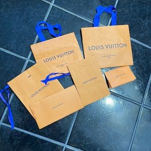 Louis Vuitton shopping bags and receipt holder